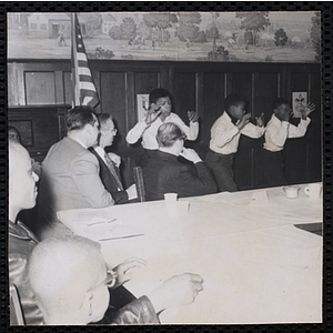 Three boys perform at a Dad's Club banquet