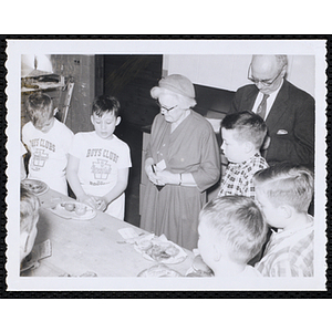 Members of the Tom Pappas Chefs' Club explain a preparation