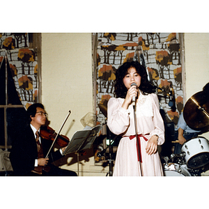 Musicians performing at a Chinese Progressive Association party