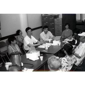 CPA members talking at a Workers' Center meeting