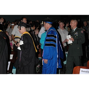 Faculty members proceed into School of Nursing convocation