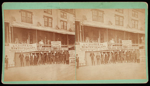 Group portrait of unidentified men standing in front of the Globe Hotel, Lowell, Mass.