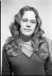 Half-length studio portrait of Carol Evans