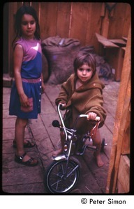 Young girls with a tricycle, Tree Frog Farm commune