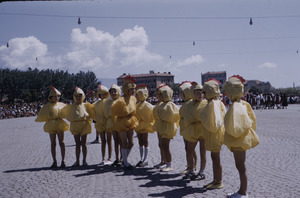 Chicken costume at Tito's birthday parade