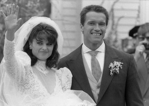 Maria Shriver (waving to the crowd) and Arnold Schwarzenegger at their wedding