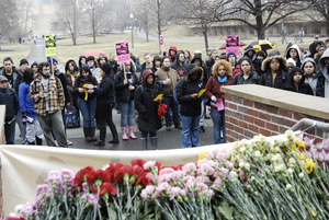 Justice for Jason rally at UMass Amherst: flowers and protesters outside the Student Union Building in support of Jason Vassell