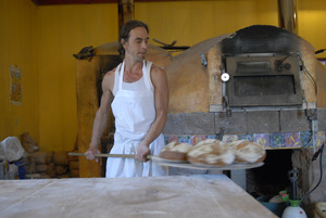 Hungry Ghost Bread: owner and baker Jonathan C. Stevens with fresh-baked bread