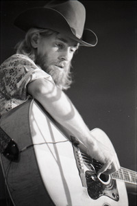New Riders of the Purple Sage opening for the Grateful Dead at Sargent Gym, Boston University: John 'Marmaduke' Dawson playing acoustic guitar