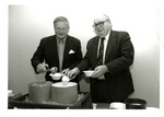 Suffolk University faculty and administrators scoop ice cream at the Charitable Campaign Ice Cream Scoop, photograph, circa 1990s