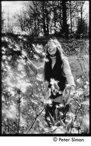 Lacey Mason with dandelions, Tree Frog Farm commune
