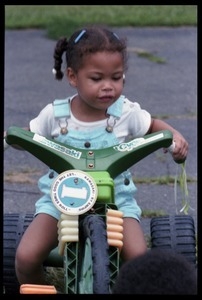 Zena Allen on a tricycle