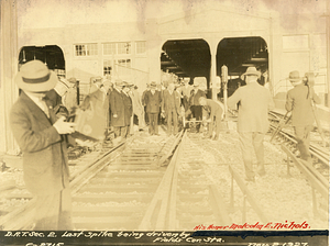 Dorchester Rapid Transit section 2. Last spike being driven by His Honor Malcom E. Nichols - Fields Corner Station