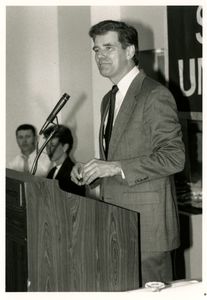Athletics Director James E. Nelson speaking at Suffolk University's athletics banquet, 1990