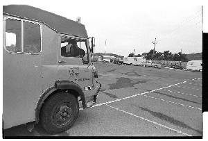 Travellers being evicted from a Downpatrick car park by council officials while police (RUC officers) stand by to keep order