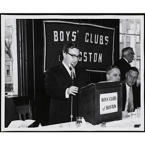 State Senator John E. Powers speaking at the podium during a Boys' Clubs of Boston awards event