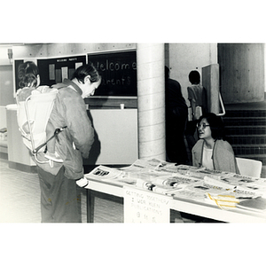 Guest in the lobby of the Josiah Quincy School, while attending a program about the normalization of U.S. and China relations