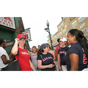 Meghan Eliason looks at the camera when the Torch Scholars visit Fenway Park