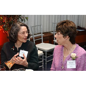 Two College of Education graduates converse at The National Council Dinner