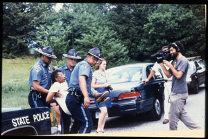 State troopers arresting an unidentified protester, filmed by Robby Leppzer