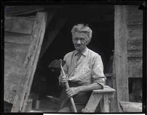 Walter H. Heath, self-proclaimed "Poet of Monadnock," posed with a hoe