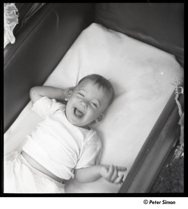 Baby Peter Simon in a crib