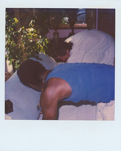 A Photograph of Marsha P. Johnson and George Flimlin Changing the Sheets of David Combs’ Bed