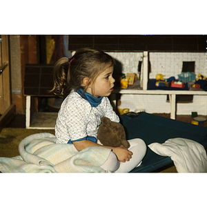 Young child with a teddy bear