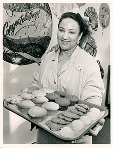 Charo Rosario holding baked goods