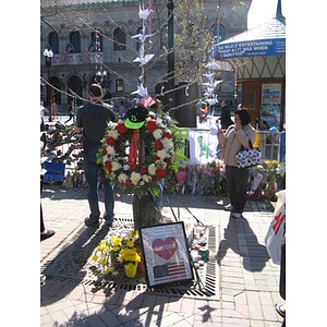 Flower wreaths at Boston Marathon Copley Square memorial