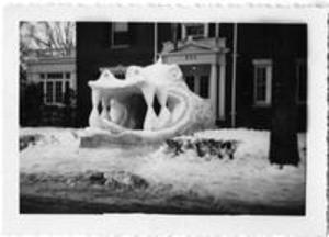 Dragon sculpture in front of Beta Theta Pi Fraternity House