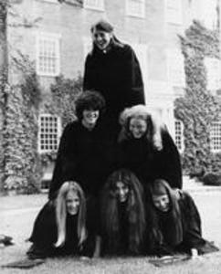 The first class of female graduates make a pyramid, 1971