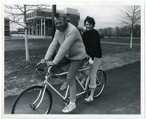 Charles and Polly Longsworth on bicycle