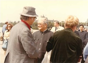 Congressman John Joseph Moakley and Evelyn Moakley are greeted by Chinese officials at the airport during a congressional trip to China