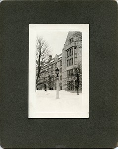 Saint Mary's Hall exterior: front entrance with street lamp in snow, by Clifton Church