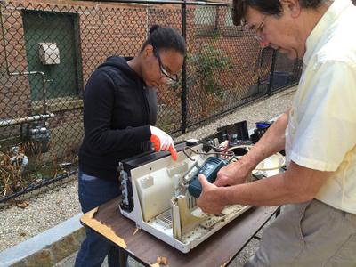 Nessie Dubuisson prepares her ACT-SO project with science advisor Grady Moates