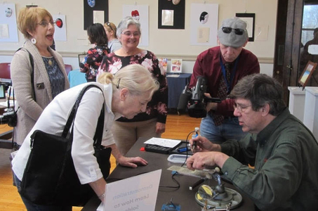 Grady demonstrates soldering at Brockton Public Library Makerspace launch party