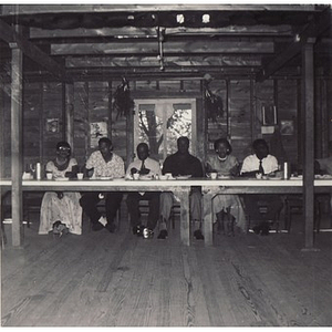 Breezy Meadows Camp staff members, eating a meal in the dining hall