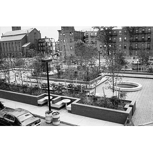 Work on the newly designed Plaza Betances nears completion while construction of housing on the adjacent site gets underway.
