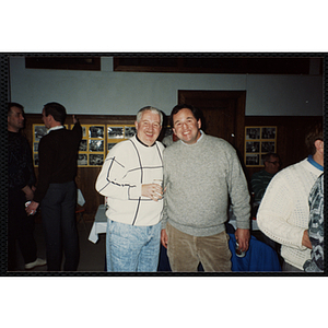 Two Bunker Hillbilly alumni share a drink at a reunion event