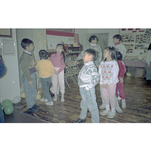 Children playing during a Chinese Progressive Association anniversary event