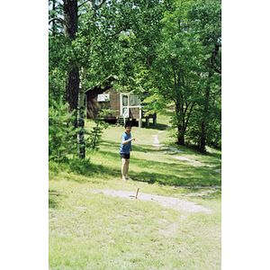 Association member plays horseshoes in New Hampshire