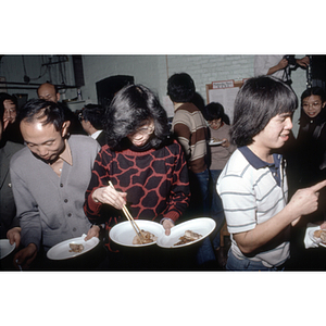 Guests eating at an International Women's Day event