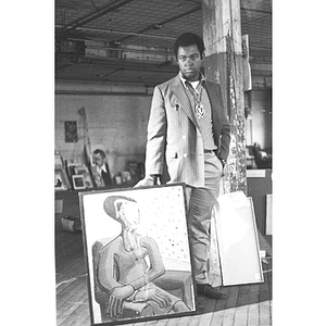 Professor Dana Chandler with one of his paintings