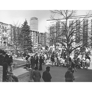 The Quad filled with students and the Prudential Tower in the background