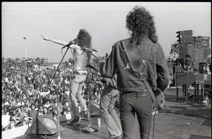 Hollywood Speedway Rock Festival: Wet Willie in performance, Jack Hall (back to camera on bass) and Jimmy Hall (vocals)