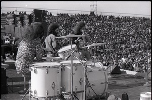 Hollywood Speedway Rock Festival: Wet Willie in performance, (l. to r.) Lewis Ross (drums), Rick Hirsch (guitar), and Jimmy Hall (harmonica)