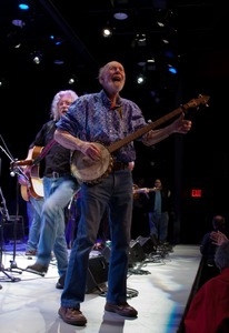 Pete Seeger (banjo) performing at the George Wein tribute, Symphony Space, New York City, with Arlo Guthrie in the background