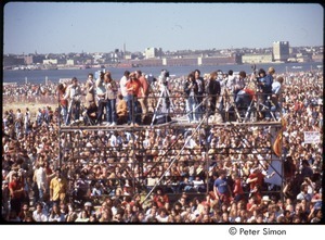 MUSE concert and rally: photographers on scaffolding amidst crowd of demonstrators