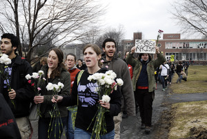 Justice for Jason rally at UMass Amherst: protesters marching from the Student Union Building in support of Jason Vassell